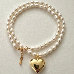 Minimalist 925 silver double-layer pearl necklace with a large gold heart pendant