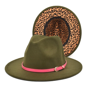 Close-up of olive green fedora hat featuring pink leather band and leopard print lining