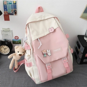 Pink and beige large capacity school backpack with bear charms and fashion badges