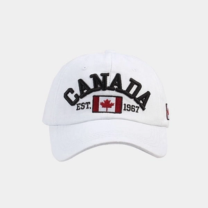 Close-up of premium Canada flag 3D embroidery on a white cotton baseball cap