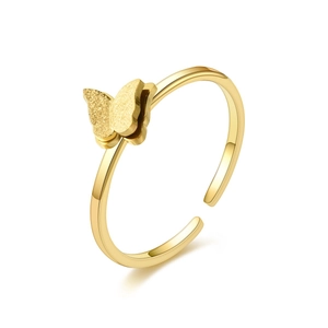 18K gold plated titanium steel butterfly open ring with textured wings on white background
