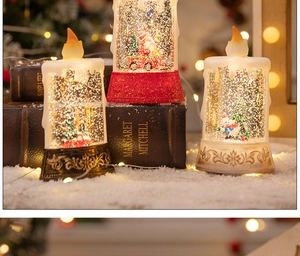 Close-up of LED Christmas water candle lamp with Santa figurine on a snowy book base