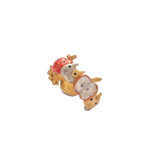 Detail of a squirrel and red apple enamel ring with golden band and hand-painted finish