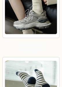 Detail of grey mesh sneakers with suede panels and blue striped cotton crew socks