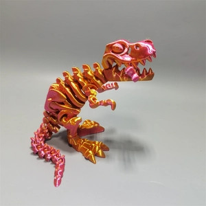 Macro shot of 3D printed T-Rex skeleton with silk orange-pink gradient and movable joints