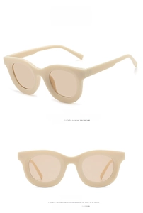 Retro oversized beige sunglasses with light tea lenses shown from front and side angles