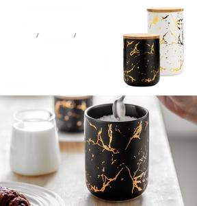 Detail of marble pattern ceramic food storage jar with bamboo lid and silicone seal