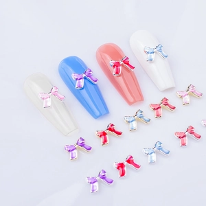 Nœuds 3D en alliage pour nail art de couleurs variées sur ongles de manucure