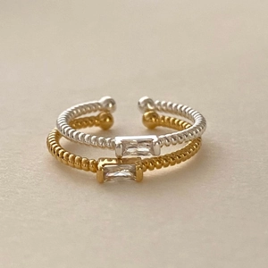 Anelli aperti in argento 925 con trama a corda e zircone rettangolare in oro e argento