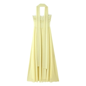 Elegant pale yellow strapless mesh maxi dress with neck scarf and high waist flowing silhouette