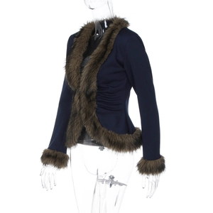 Detail view of navy slim-fit jacket showing plush brown faux fur collar and waist pleats