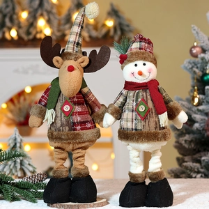 Weihnachtsfiguren aus Rentier und Schneemann mit Schneeflockenmuster und Teleskopbeinen