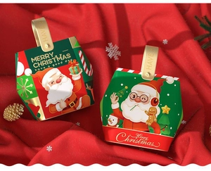 Red and green Christmas Santa candy boxes with metal handles and festive holiday patterns