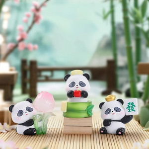 Three-piece panda figurine set with lotus and bamboo decor for oriental desktop display