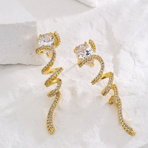 Luxury gold-plated geometric snake earrings with sparkling cubic zirconia on white stone