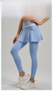 Macro view of blue skort leggings with high waist cutout and moisture-wicking fabric