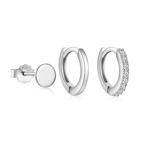 Macro detail of S925 sterling silver stamp on minimalist geometric stud earring set
