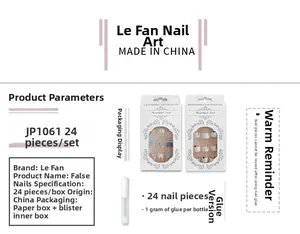 Detail view of pink long ballet press-on nails set with glue and packaging specs