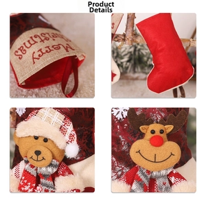 Close-up of Merry Christmas stockings showing plush bear and reindeer 3D details