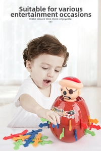 Children playing with a pirate barrel toy featuring colorful plastic swords for fun parties