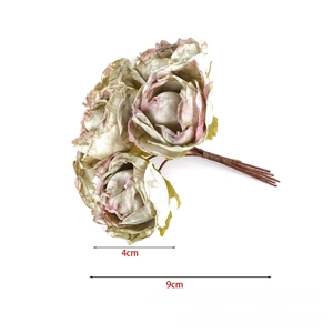 Close-up of artificial burnt edge roses in pink and white for DIY decoration and crafts
