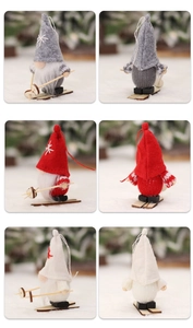 Detail of knit skiing gnomes ornaments with star embroidery and wooden skis in 3 colors