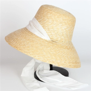 Hepburn style straw sun hat with wide brim and white chiffon ribbon for beach travel