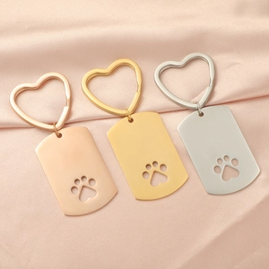 Polished stainless steel pet tag keychains with hollow paw design in three metal colors