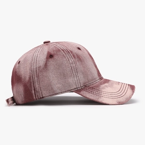 Distressed wash baseball cap in vintage burgundy with a classic curved brim design