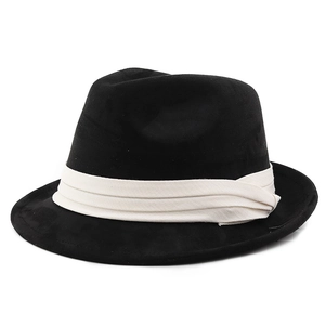 Detailed top view of black felt fedora hat with a triple-layered cream decorative band