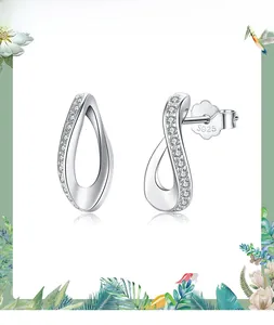 Close-up of S925 sterling silver drop earrings with pavé set cubic zirconia crystals