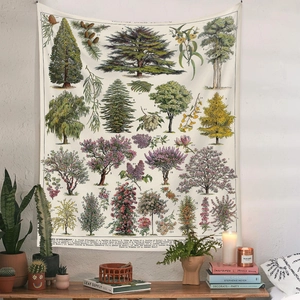 Detail view of a vintage botanical wall tapestry styled in a cozy home interior setting