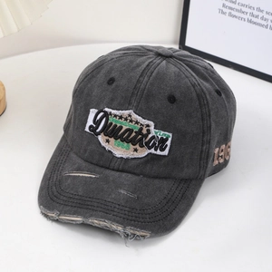 Vintage washed charcoal baseball cap with letter embroidery and distressed brim details