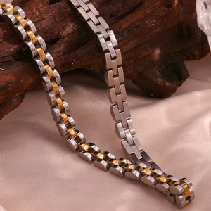 Detail of 6mm stainless steel watchband link necklace in silver and 18K gold finishes