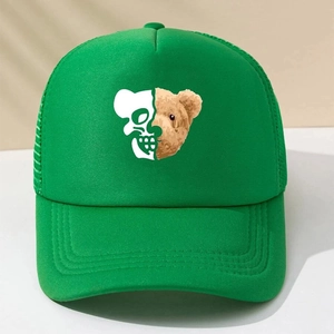 Detailed front view of green trucker hat with creative cartoon teddy bear print