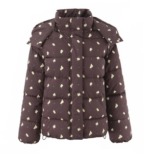 Detailed macro view of the small floral pattern on this hooded winter jacket for women