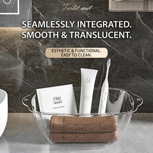 Transparent multifunctional washbasin with double handles on a luxury marble counter