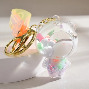 Creative liquid-filled bear keychain with colorful beads and orange wrist strap