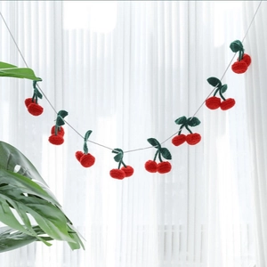 Handmade red crochet cherry garland with green leaves for home wall decoration