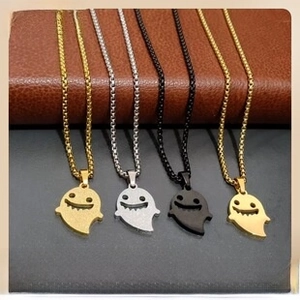 Ghost pendant necklaces in gold, silver and black with hollow smiling faces on square pearl chains