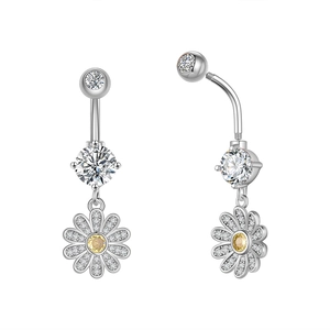 Macro detail of silver daisy belly ring with yellow heart and clear cubic zirconia