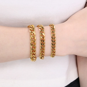 Three varying widths of 18K gold plated Cuban link bracelets shown on a model wrist