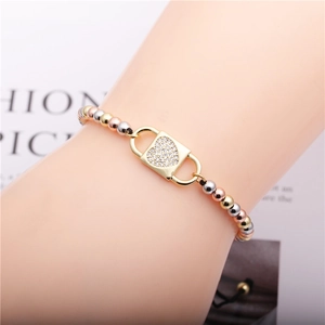 Adjustable cord bracelet featuring tricolor metal beads and a zircon heart-shaped clasp