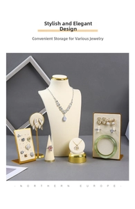 Elegant cream microfiber jewelry display set with gold metal bases for rings and necklaces