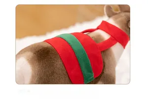 Macro detail of plush reindeer back featuring festive red and green velvet straps