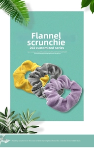 Trio of premium velvet scrunchies in yellow, grey, and purple with pleated detail