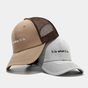 Neutral mesh trucker caps and grey baseball hats with minimalist letter embroidery