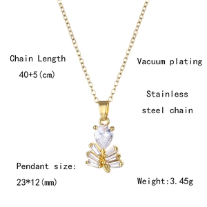 Detail view of gold cedar tree pendant with zircon, showing 40+5 cm chain and 23x12 mm size