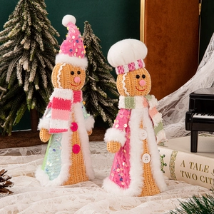 Standing gingerbread man plush pair in pink and white sequins for Christmas decor