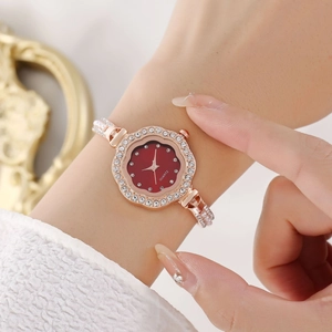 Elegant gold quartz watch for women featuring a red floral dial with crystal accents